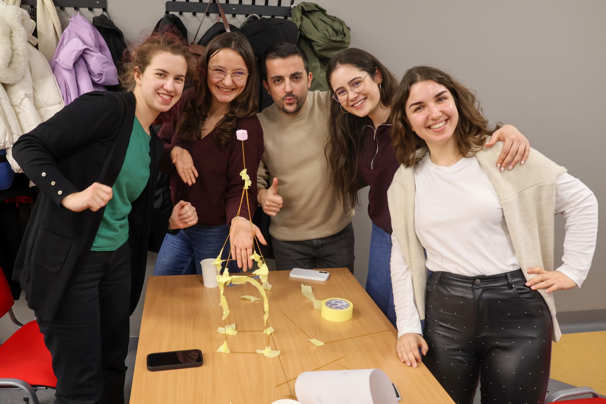 One of groups presenting their spaghetti tower.